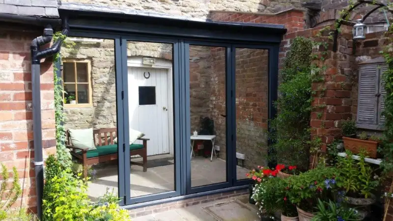 Orangery Folding Sliding Bi-Fold Doors: Swipe To View More Images